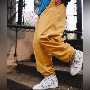 Only NY Lodge Nylon track pants in mustard yellow NWT sz XL